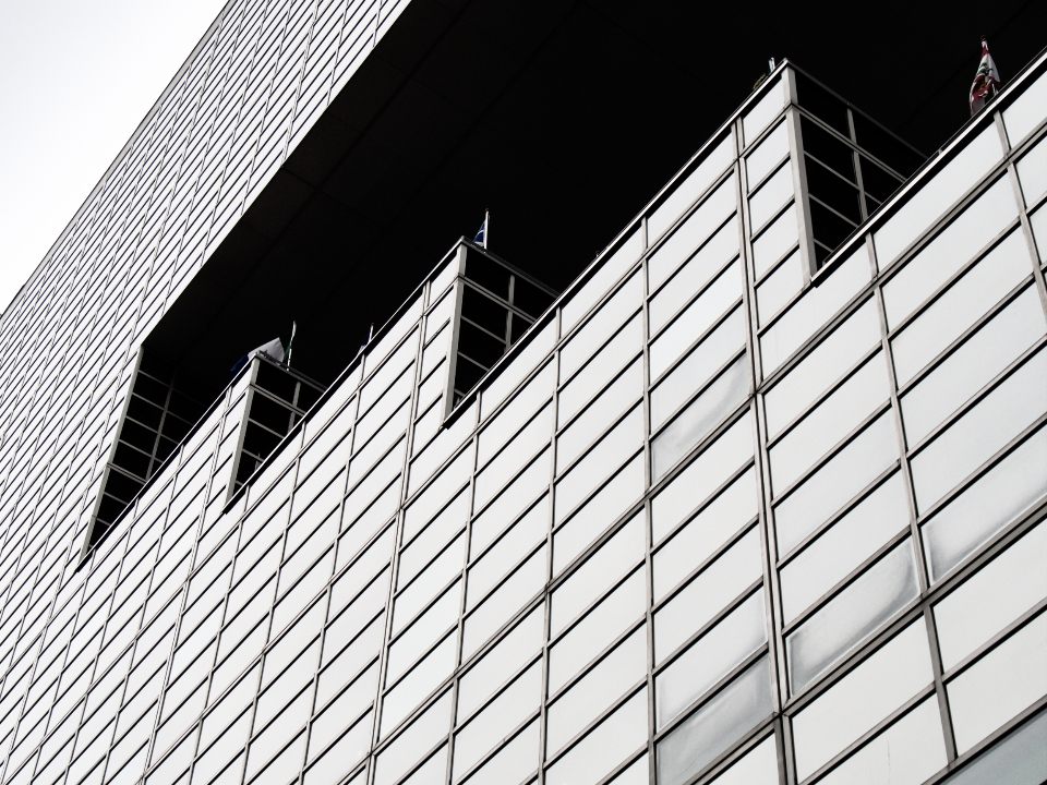 New aluminum storefront compared with replacement glass
