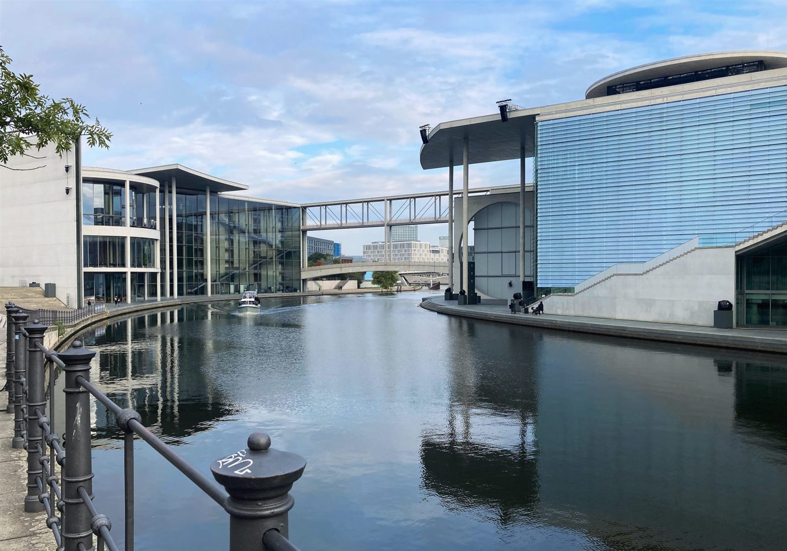 Glass building beside waterfront