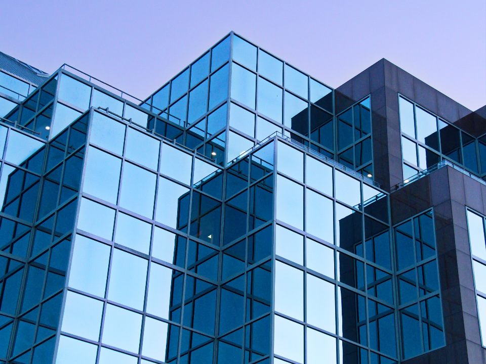 Glass panels set in a commercial storefront window system