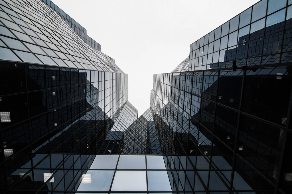Commercial glazing contractors finished a reflective glass facade